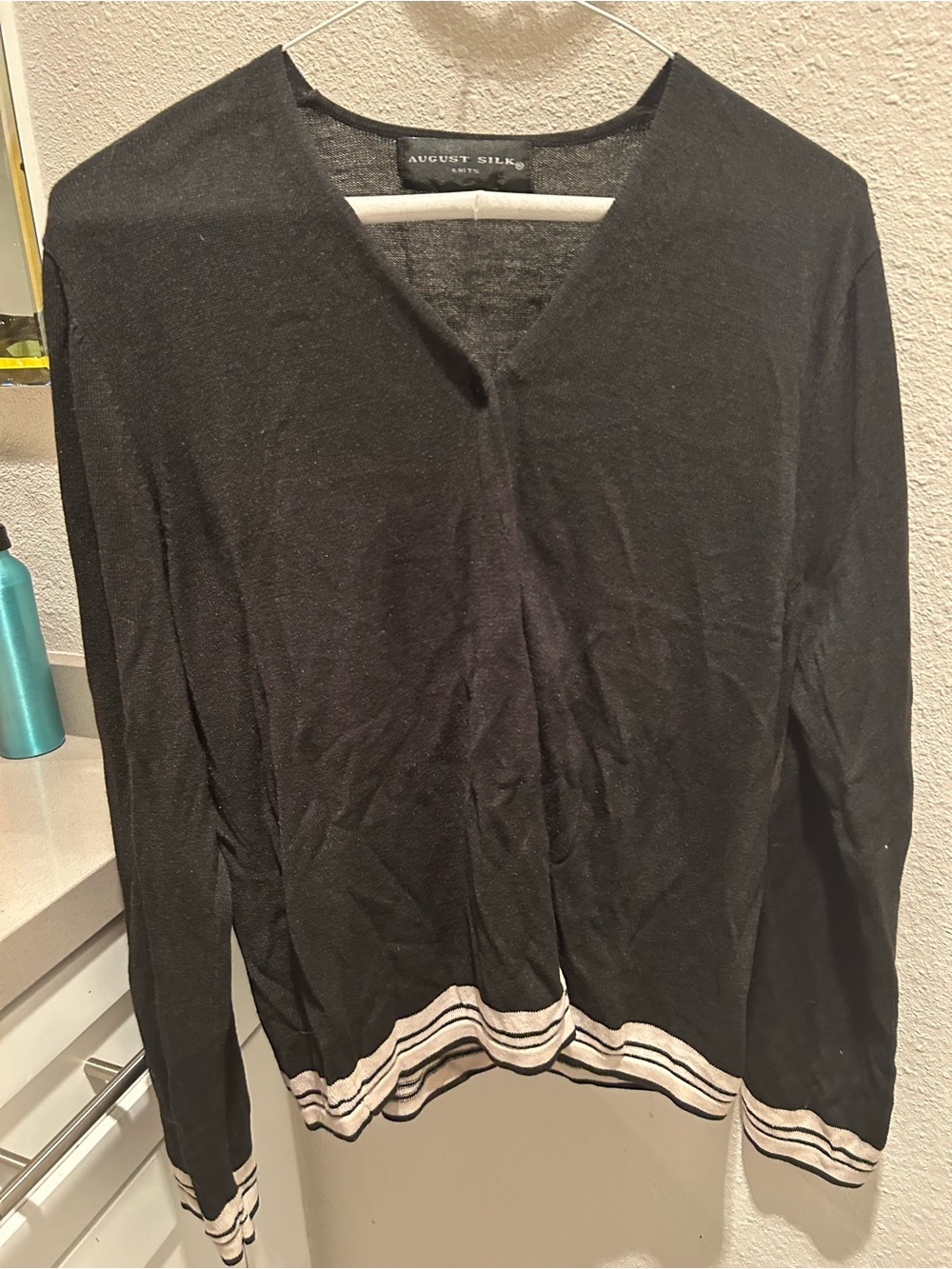 august silk Black V-Neck Sweater with Cream Striped Hem